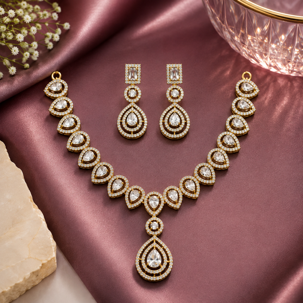 Gold Tone Crystal Teardrop Necklace and Earrings Set