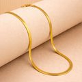 Encliff snake chain necklace with a smooth, flexible design in shiny metal, showcasing its elegant, sleek appearance.